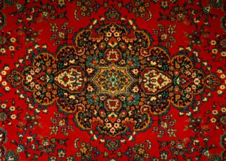 a red carpet with a colorful design on it