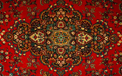 a red carpet with a colorful design on it